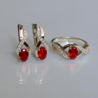 Срібний набір з золотими пластинами