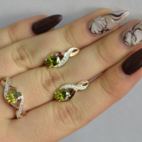 Срібний набір з золотими пластинами