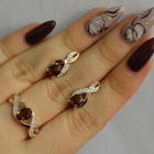 Срібний набір з золотими пластинами