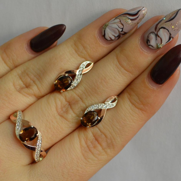 Срібний набір з золотими пластинами