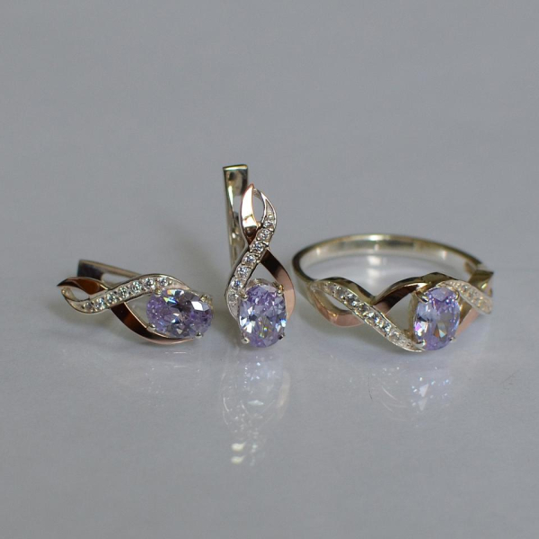 Срібний набір з золотими пластинами