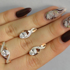 Срібний набір з золотими пластинами