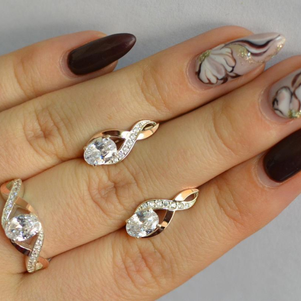 Срібний набір з золотими пластинами