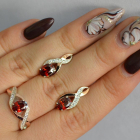 Срібний набір з золотими пластинами