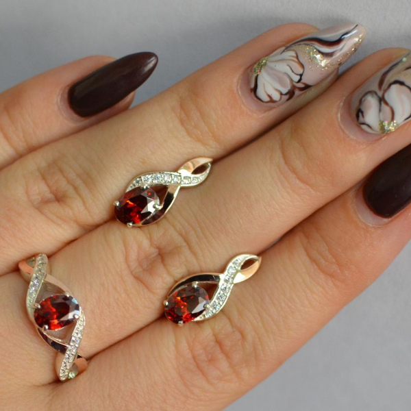 Срібний набір з золотими пластинами