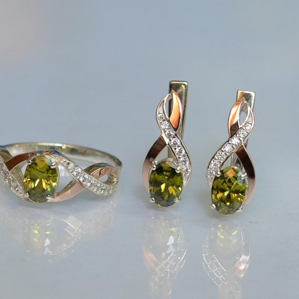 Срібний набір з золотими пластинами