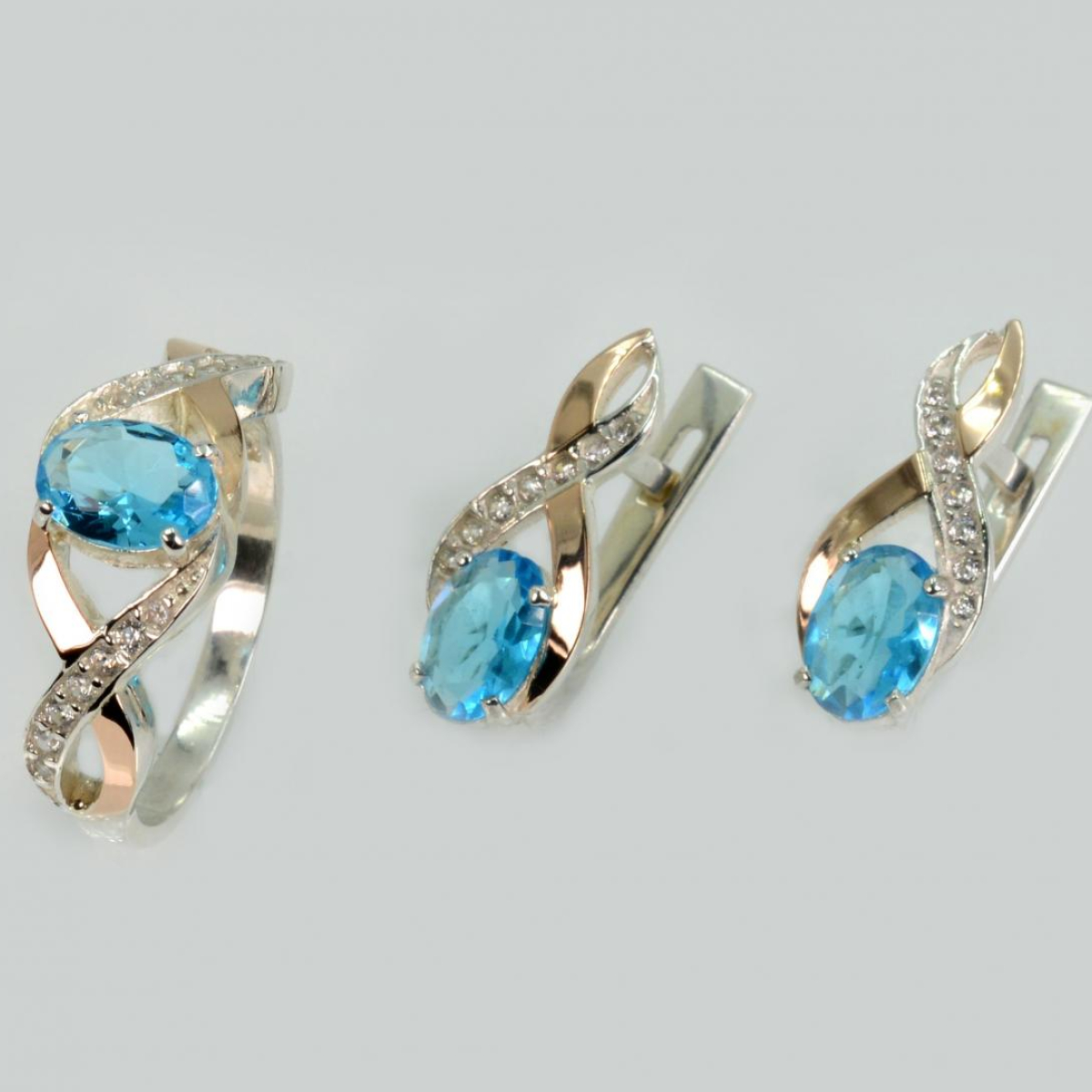 Срібний набір з золотими пластинами