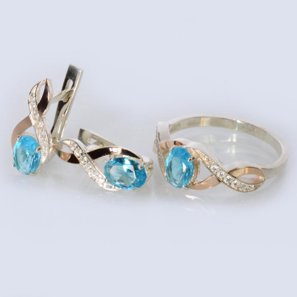 Срібний набір з золотими пластинами