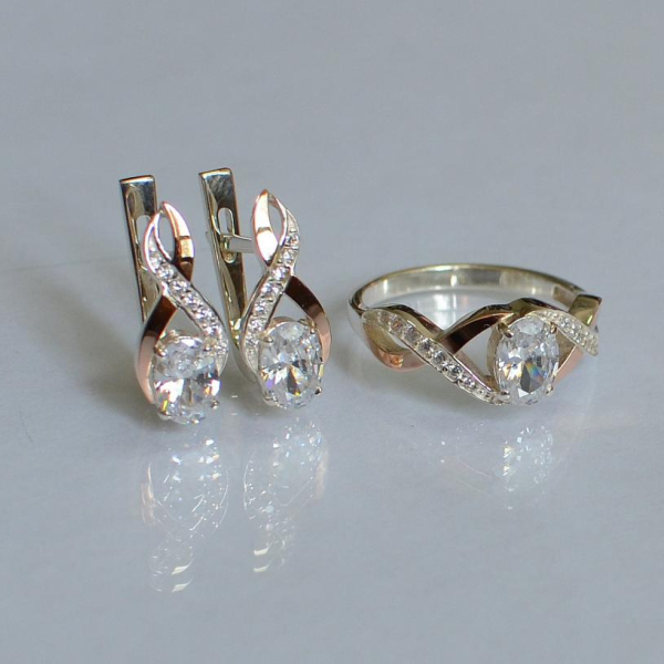 Срібний набір з золотими пластинами