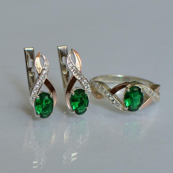 Срібний набір з золотими пластинами