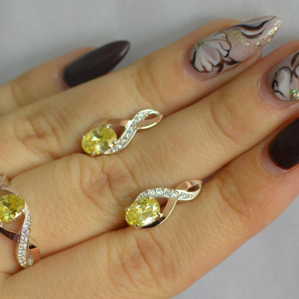 Срібний набір з золотими пластинами