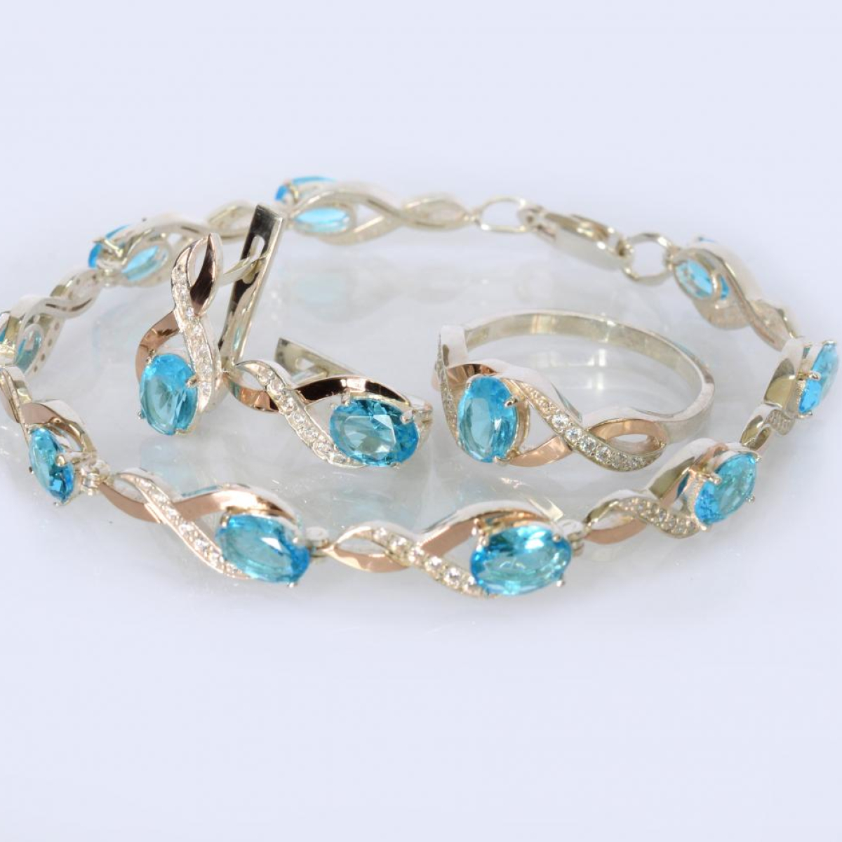 Срібний комплект прикрас( Браслет, сережки та каблучка)