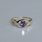 Срібна каблучка з золотими вставками