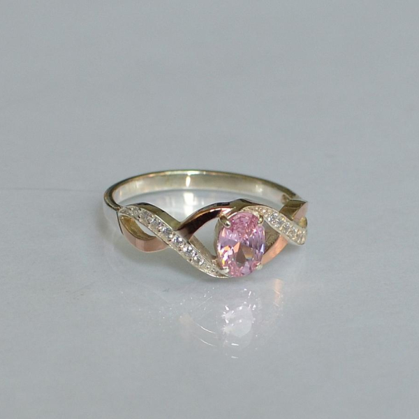 Срібна каблучка з золотими вставками