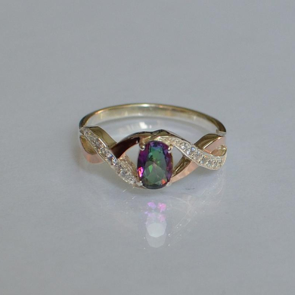 Срібна каблучка з золотими вставками