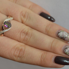 Срібна каблучка з золотими вставками