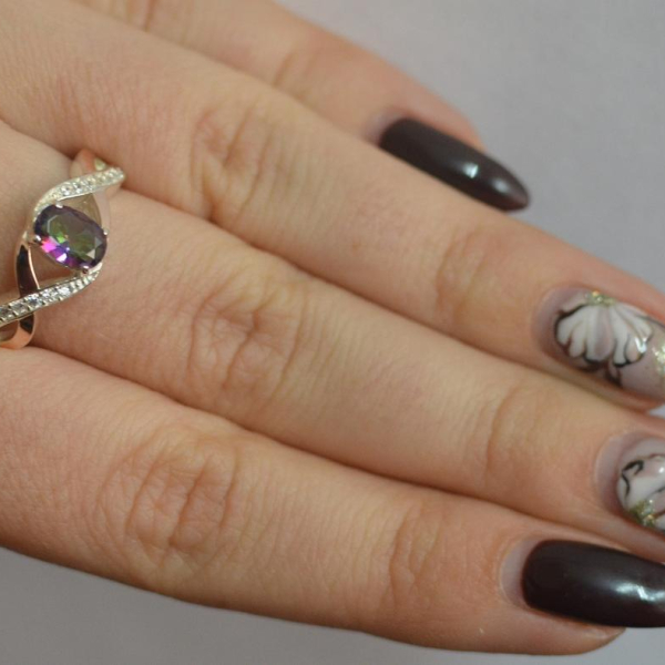 Срібна каблучка з золотими вставками