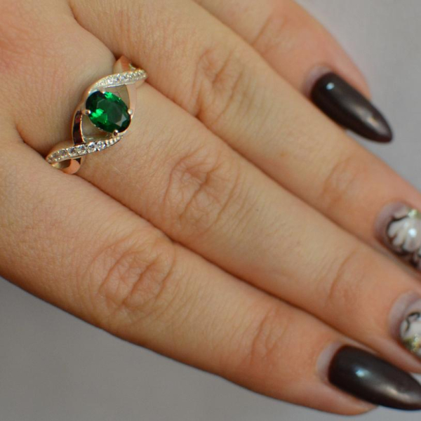 Срібна каблучка з золотими вставками