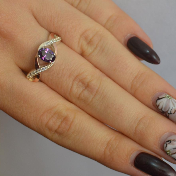 Срібна каблучка з золотими вставками