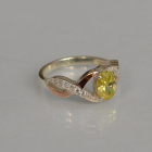 Срібна каблучка з золотими вставками