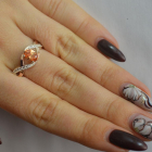 Срібна каблучка з золотими вставками