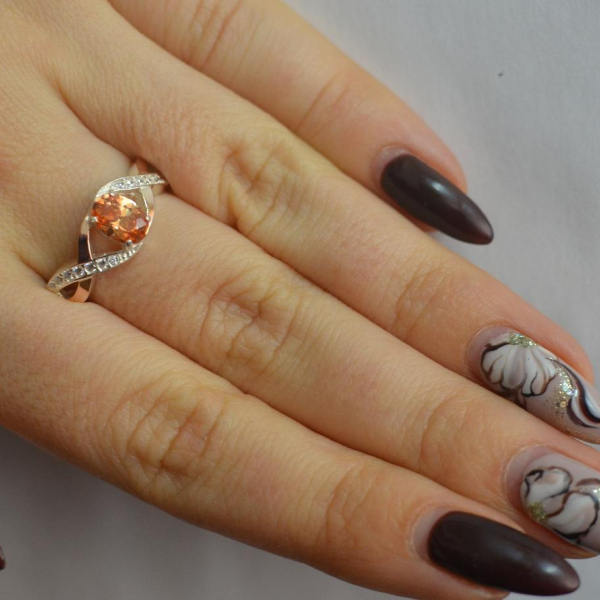 Срібна каблучка з золотими вставками