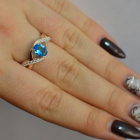 Срібна каблучка з золотими вставками