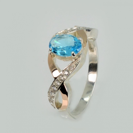 Срібна каблучка з золотими вставками