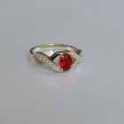 Срібна каблучка з золотими вставками