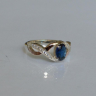 Срібна каблучка з золотими вставками