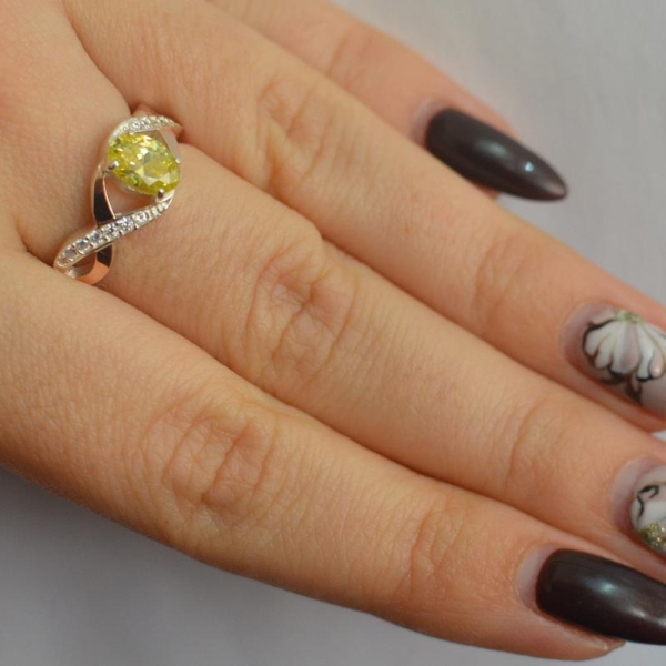 Срібна каблучка з золотими вставками