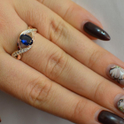 Срібна каблучка з золотими вставками