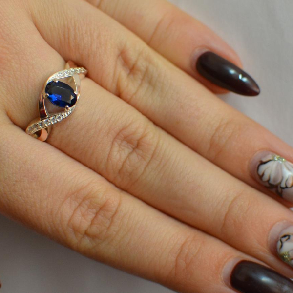 Срібна каблучка з золотими вставками