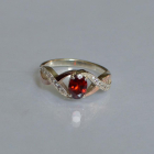 Срібна каблучка з золотими вставками