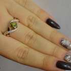 Срібна каблучка з золотими вставками