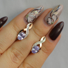 Срібні сережки з золотими вставками