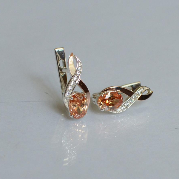 Срібні сережки з золотими вставками