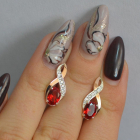 Срібні сережки з золотими вставками