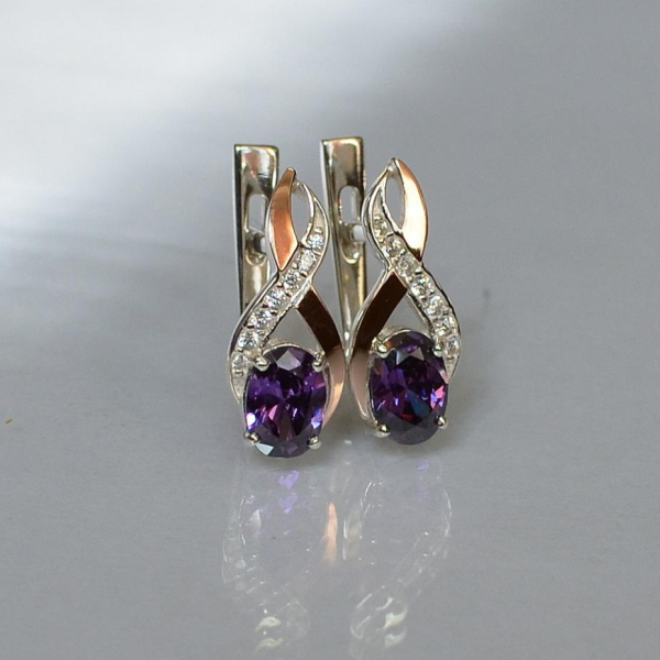 Срібні сережки з золотими вставками