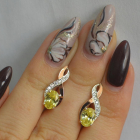 Срібні сережки з золотими вставками