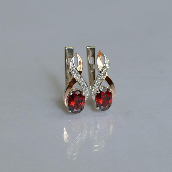 Срібні сережки з золотими вставками