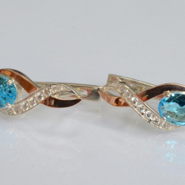 Срібні сережки з золотими вставками