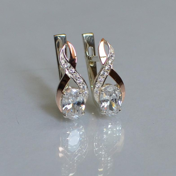 Срібні сережки з золотими вставками