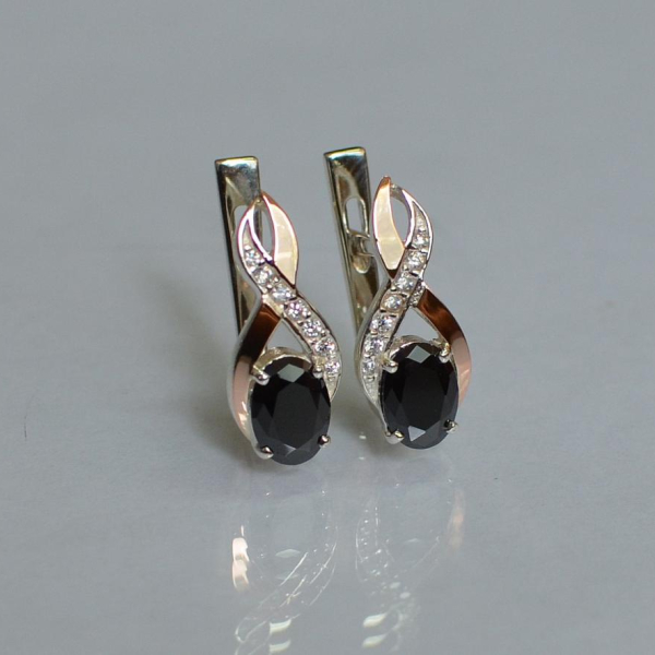 Срібні сережки з золотими вставками