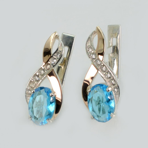 Срібні сережки з золотими вставками