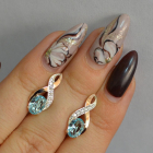 Срібні сережки з золотими вставками