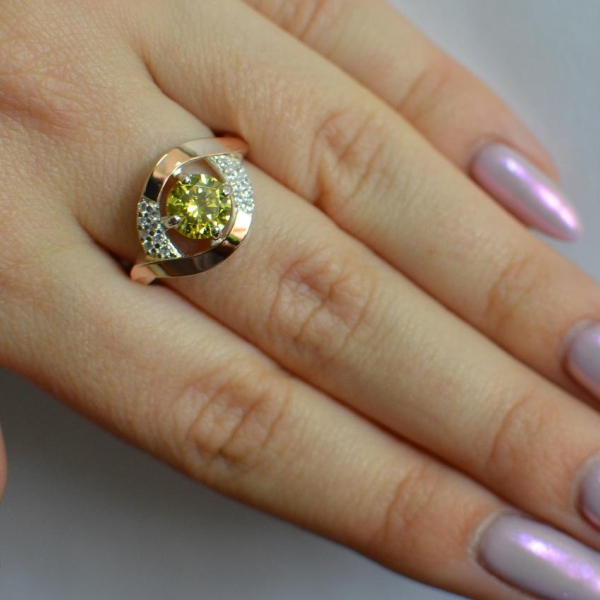 Срібна каблучка з золотими накладками