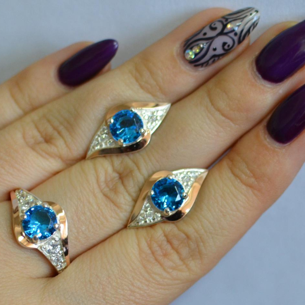 Срібний набір з золотими пластинами