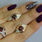 Срібний набір з золотими пластинами