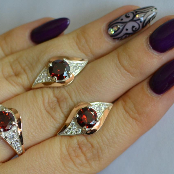 Срібний набір з золотими пластинами